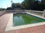 Chalet con garaje, piscina y aire acondicionado