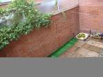 Cuco apartamento con terraza de madera