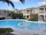 Bonito apartamento con terraza, jardines y piscina
