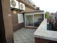 �tico en la calle Caballero