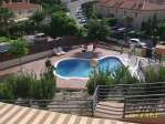 Casa adosada con piscina comunitaria