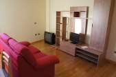 Amplio estudio con dormitorio independiente.