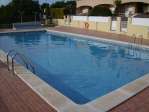 Casa adosada con garaje y piscina